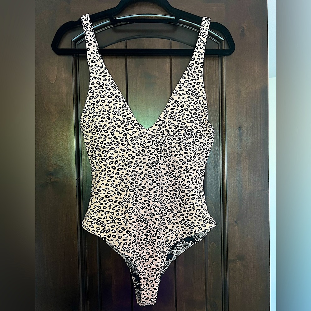 Sexy low cut reversible bathing suit. Size medium